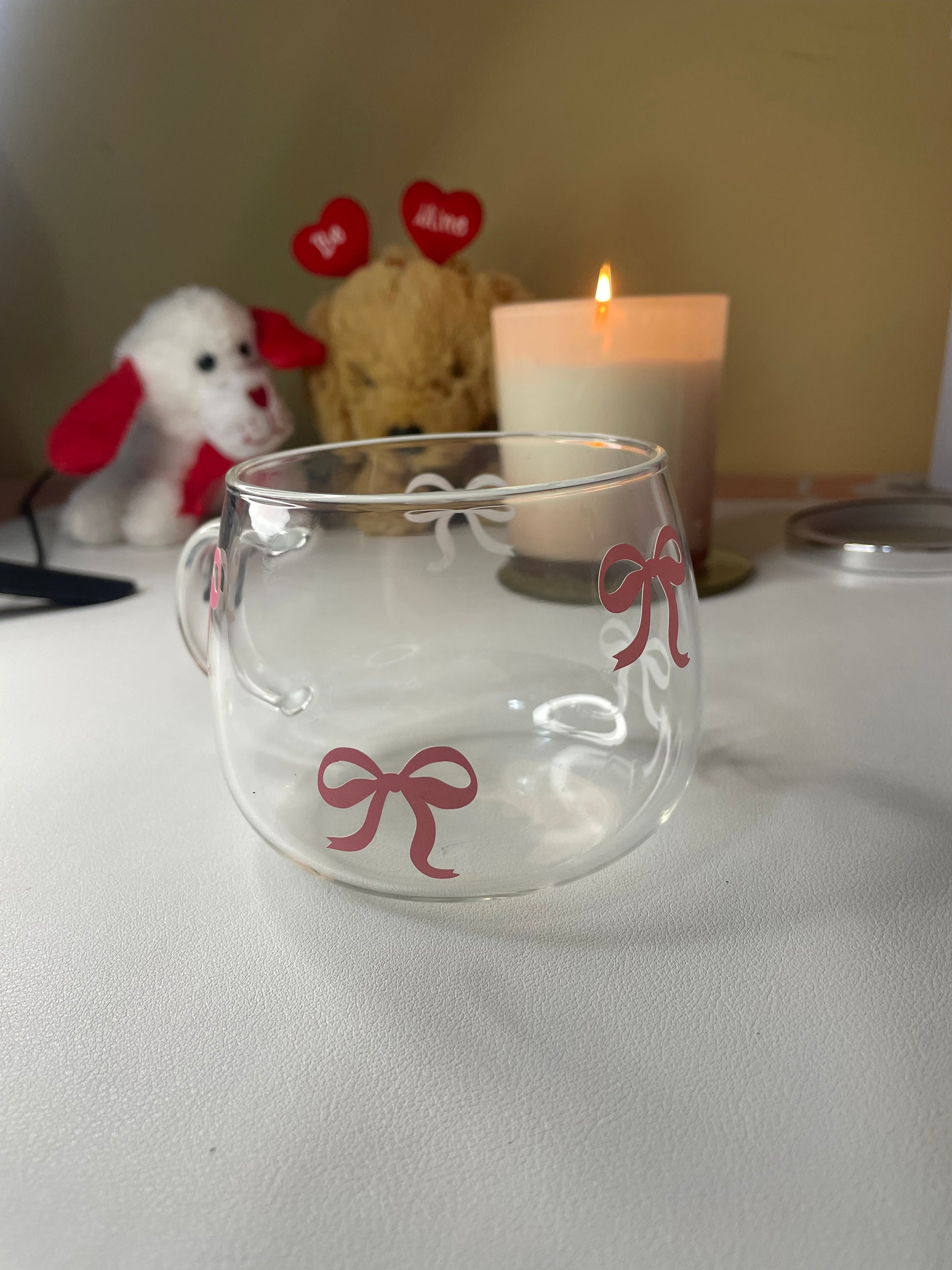 Pink Bow Glass Cup – Cute & Aesthetic Mug for Coffee, Tea & Gifting, elegant clear mug with pink bow prints, great for handmade or customized gift ideas.